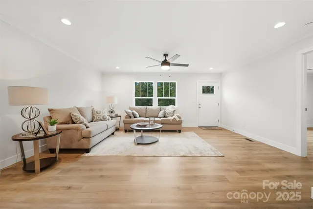 a living room with furniture and window