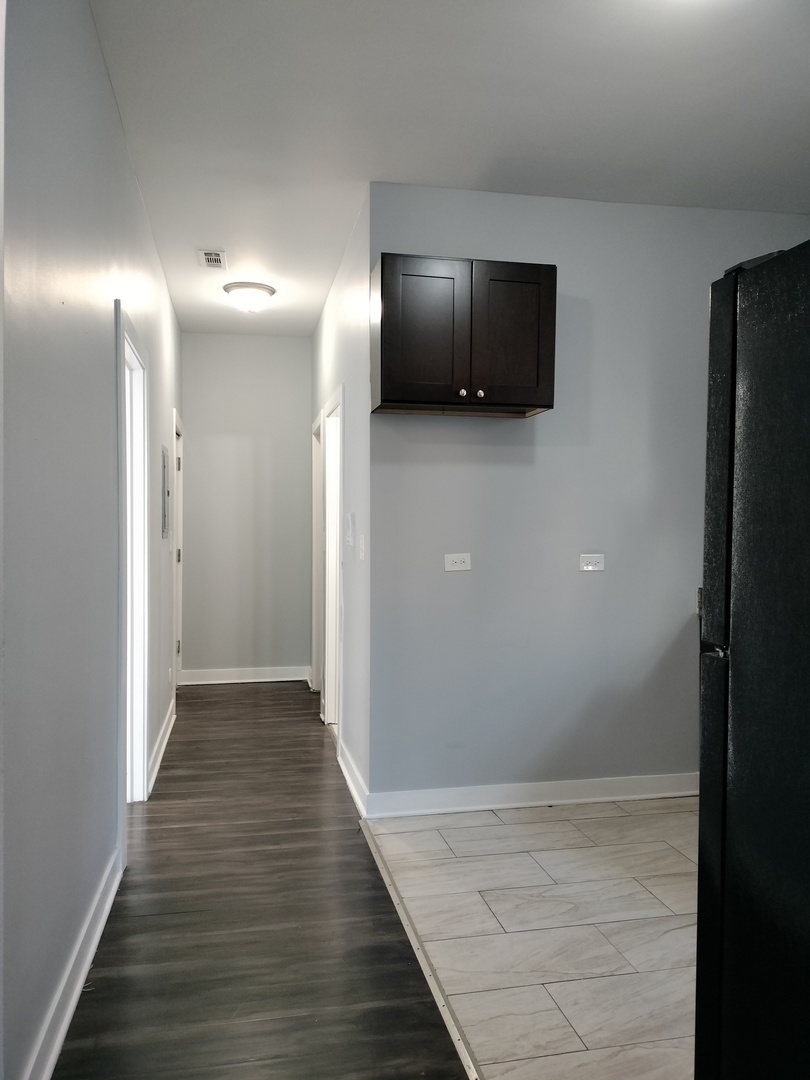 1945 West 48th Street, Unit 2 Chicago, IL 60609 - Photo 7 of 19 a view of entryway with livingroom