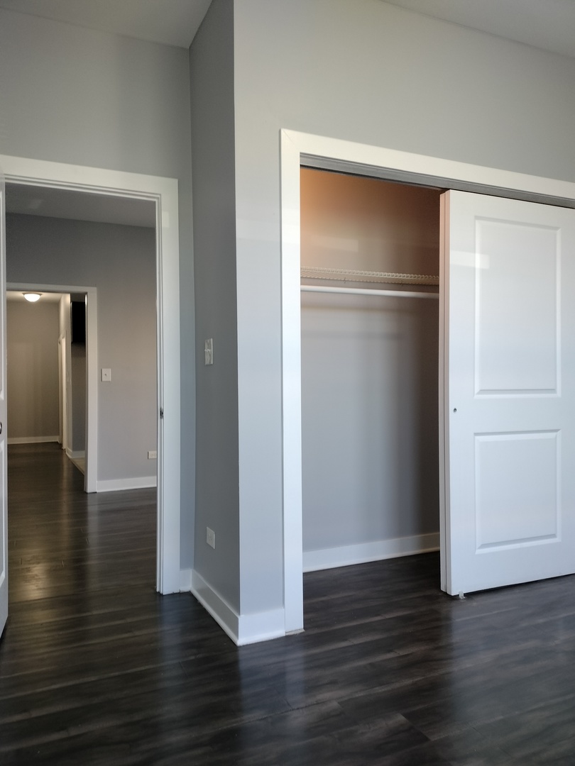 1945 West 48th Street, Unit 2 Chicago, IL 60609 - Photo 10 of 19 a view of empty room with wooden floor