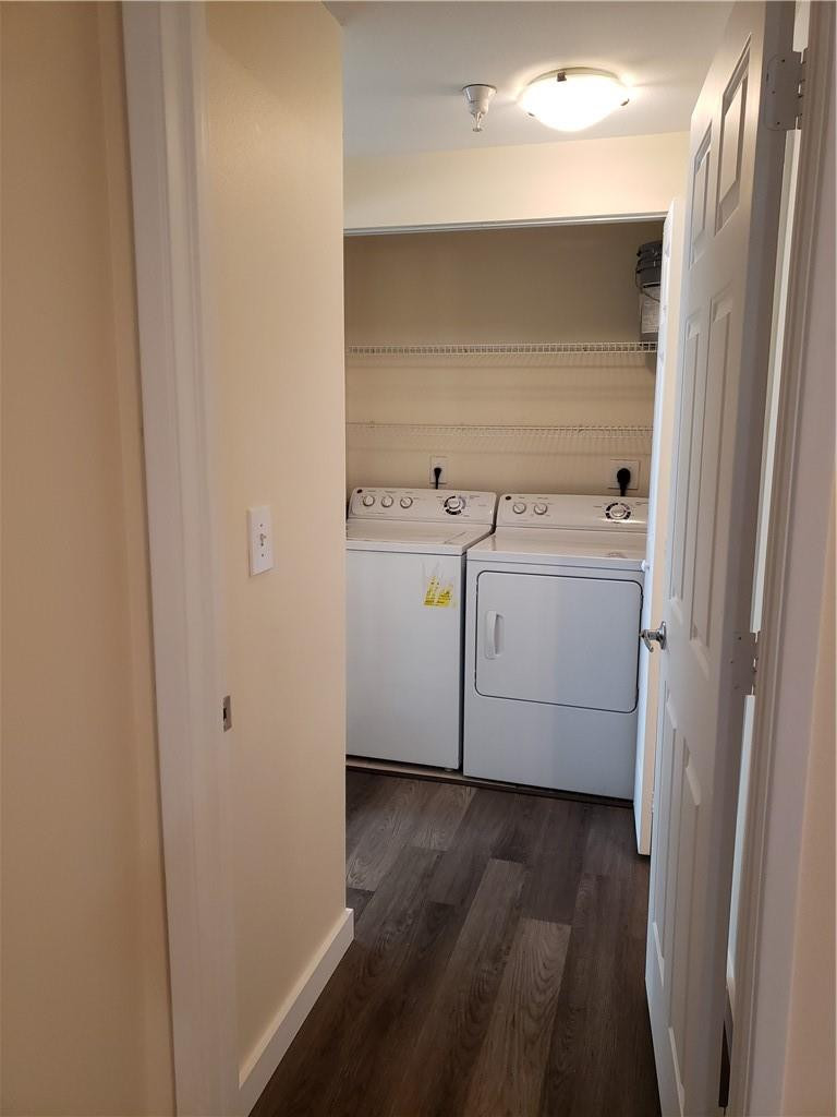 7930 North Nob Hill Road, Unit 3305 Tamarac, FL 33321 - Photo 14 of 28 a utility room with cabinets washer and dryer