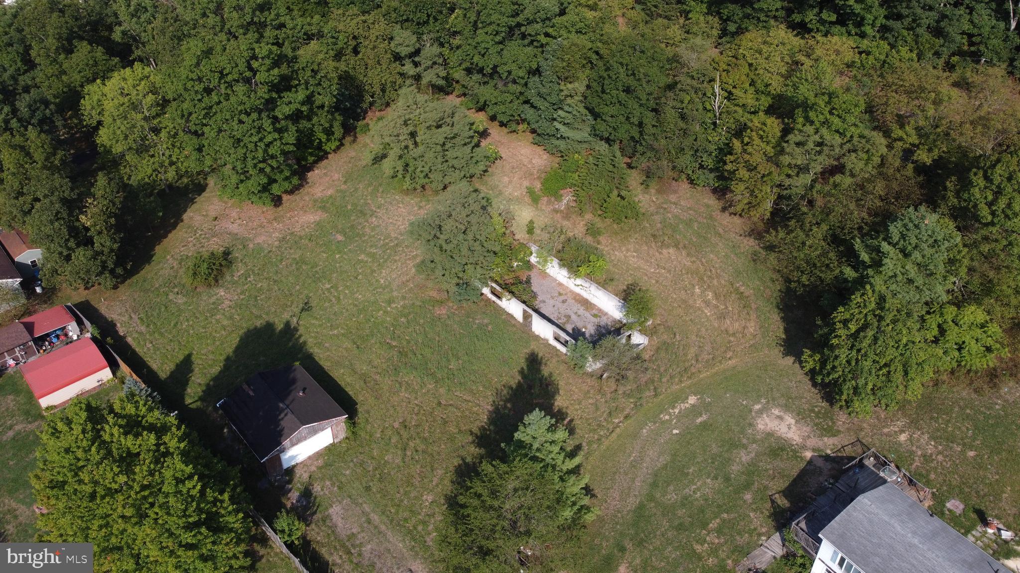Beverly Avenue Rawlings, MD 21557 - Photo 2 of 14 an aerial view of a house with a yard