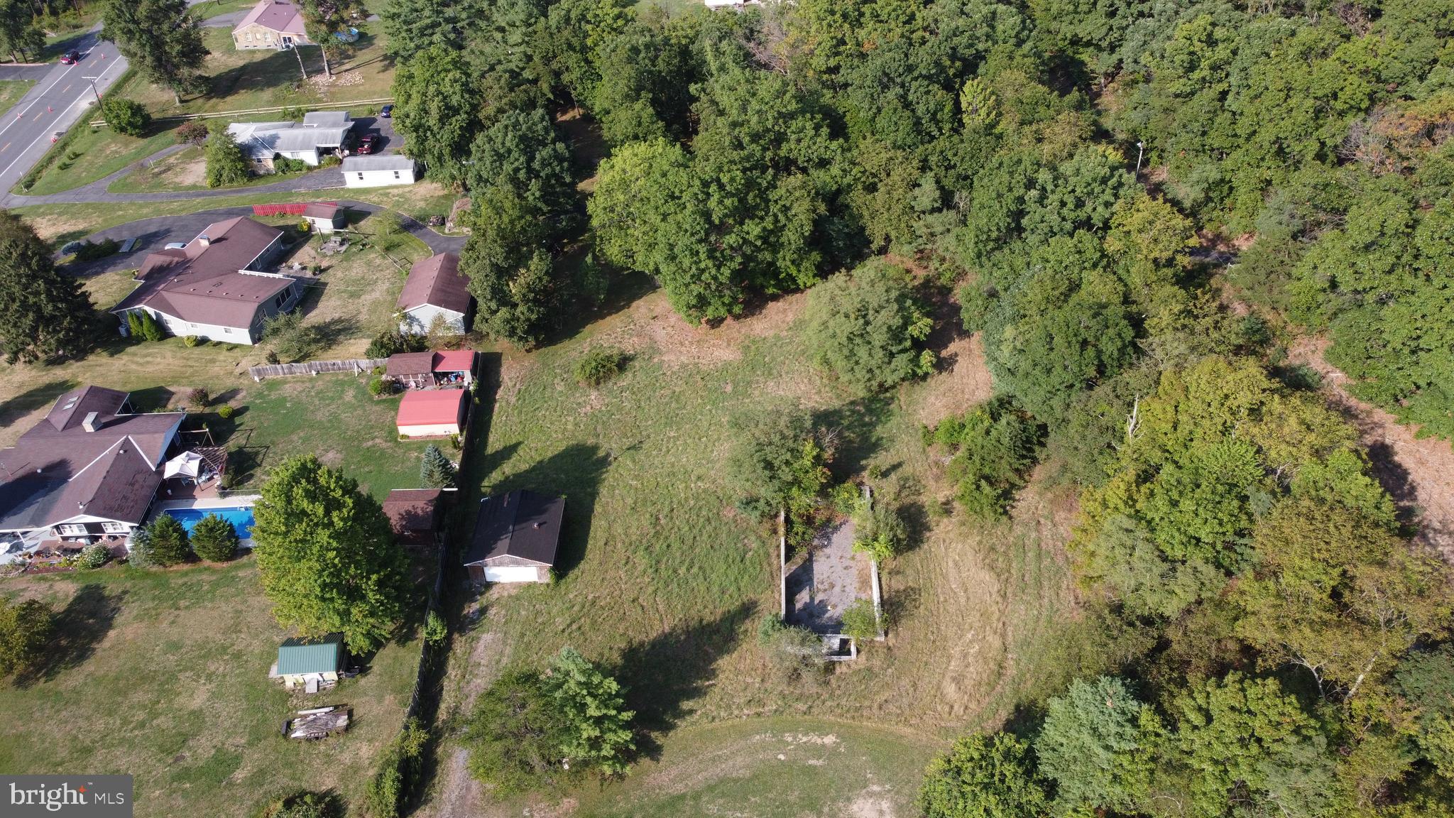 Beverly Avenue Rawlings, MD 21557 - Photo 3 of 14 an aerial view of residential houses with outdoor space