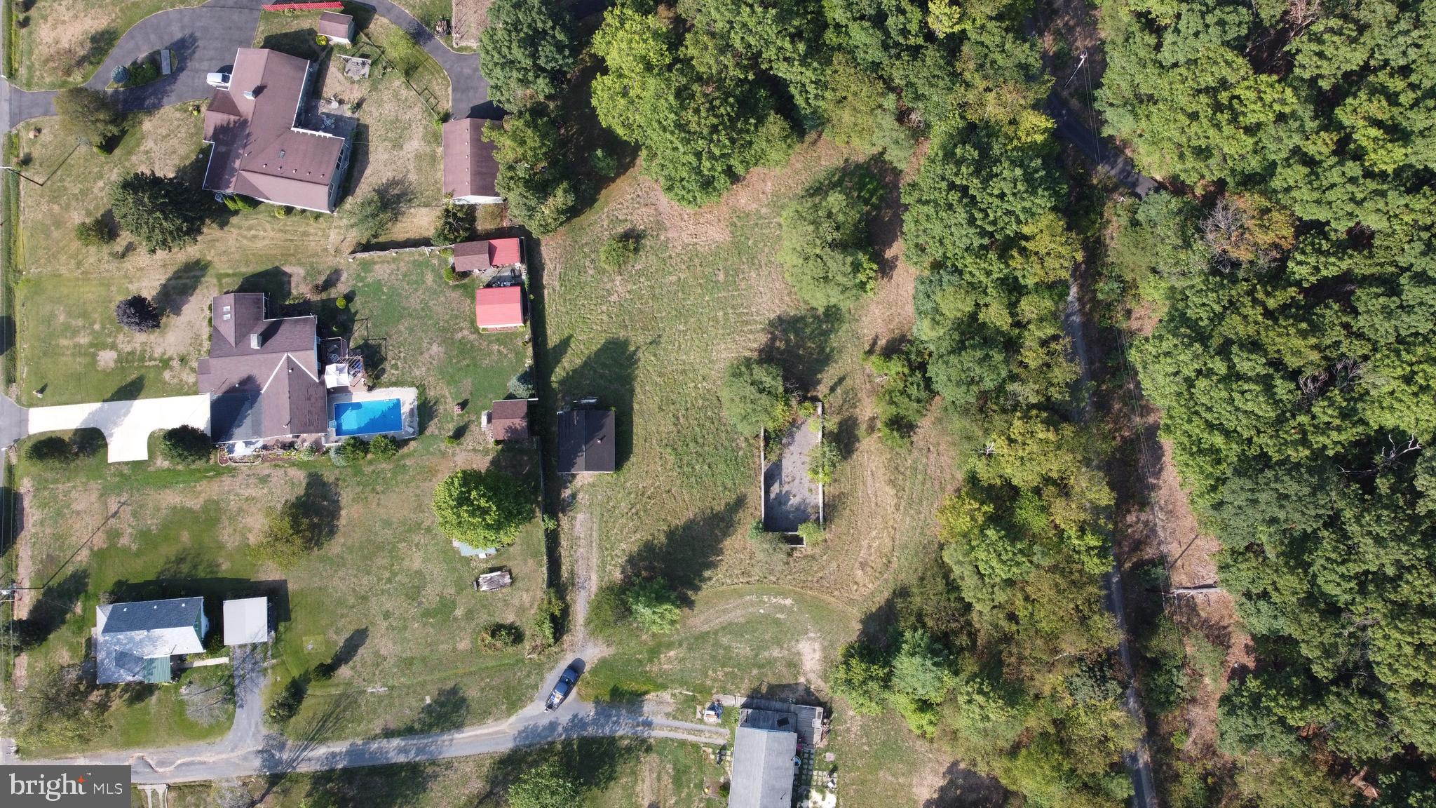 Beverly Avenue Rawlings, MD 21557 - Photo 4 of 14 an aerial view of residential houses with outdoor space