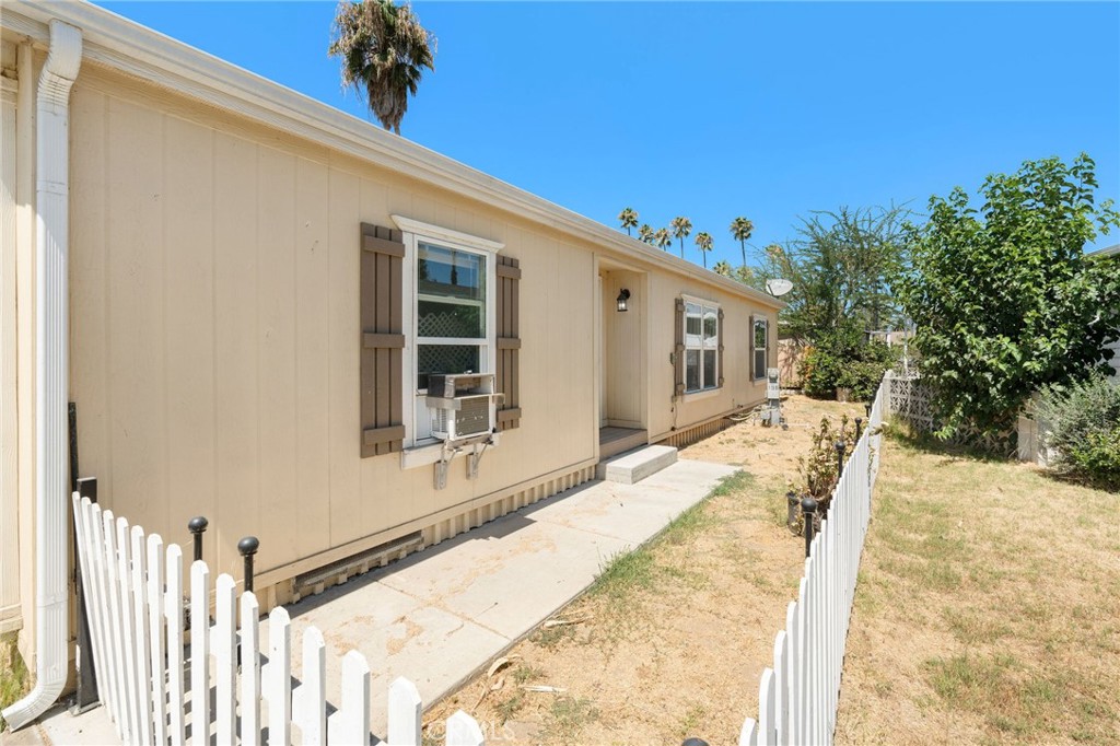 5800 Hamner Avenue, Unit 156 Eastvale, CA 91752 - Photo 16 of 20 a view of a house with a outdoor space