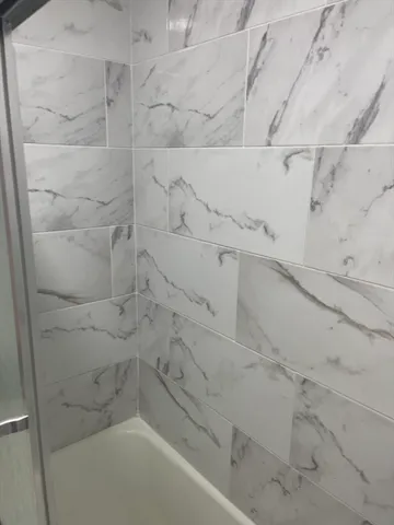 a bathroom with a bathtub