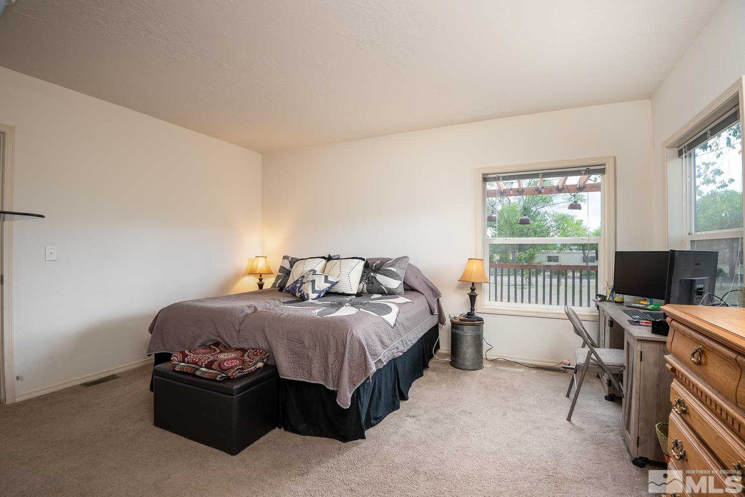 3904 Walker View Road Wellington, NV 89444 - Photo 21 of 37 a bedroom with a bed and a desk
