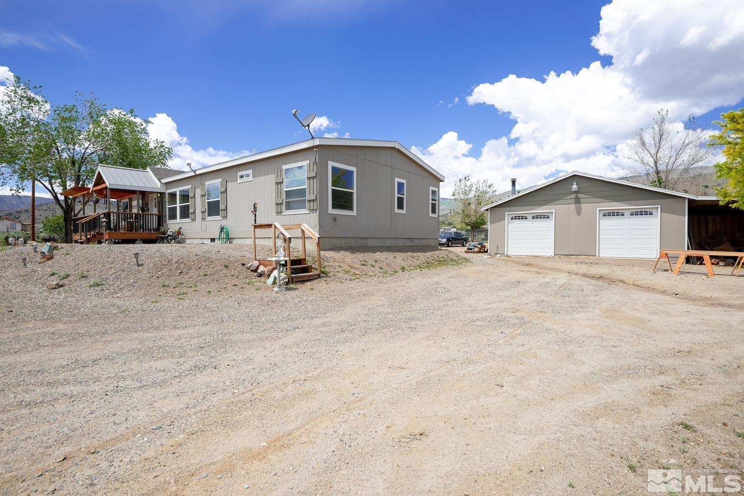 3904 Walker View Road Wellington, NV 89444 - Photo 28 of 37 a view of a house with a backyard