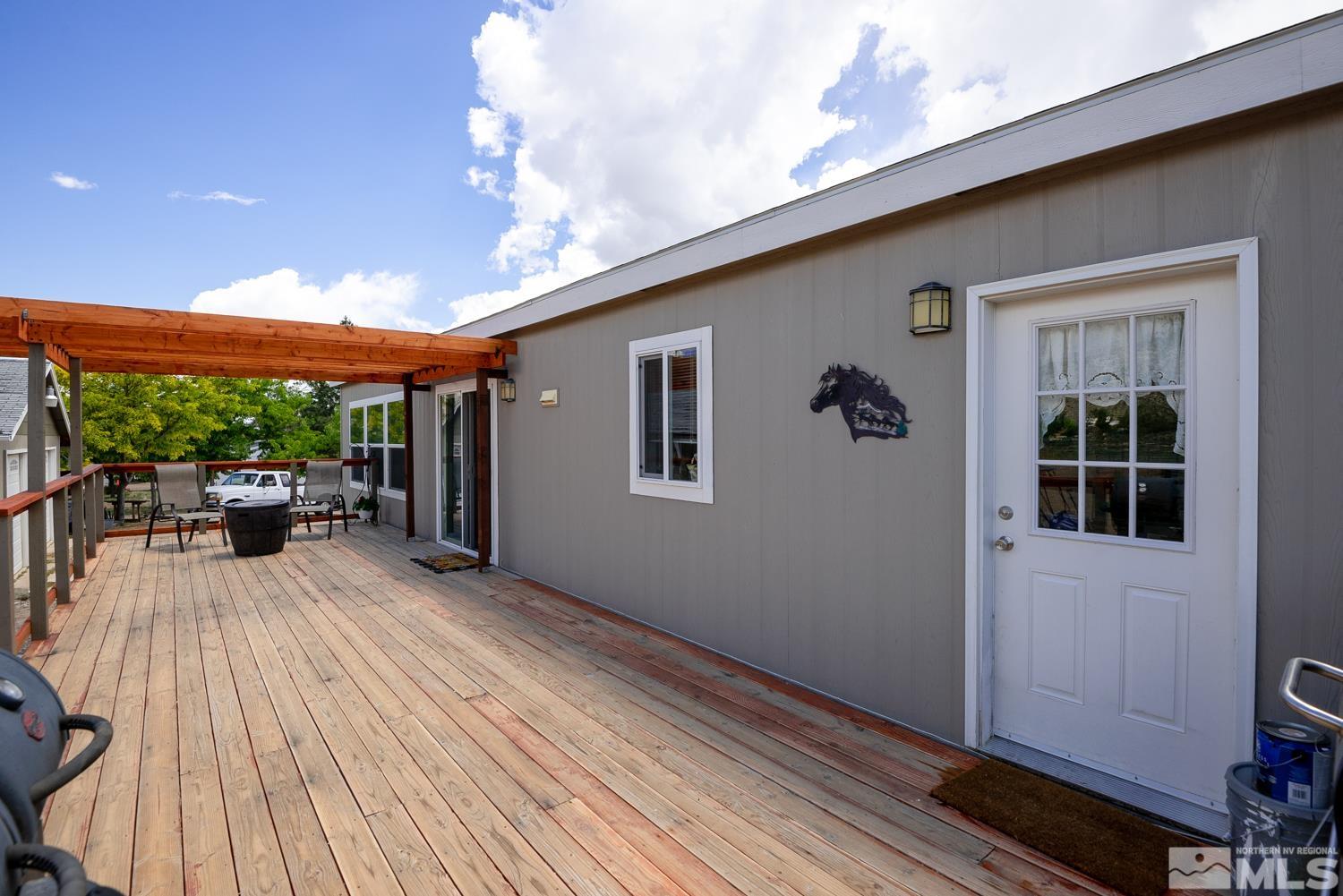 3904 Walker View Road Wellington, NV 89444 - Photo 32 of 37 a view of a house with porch and wooden floor