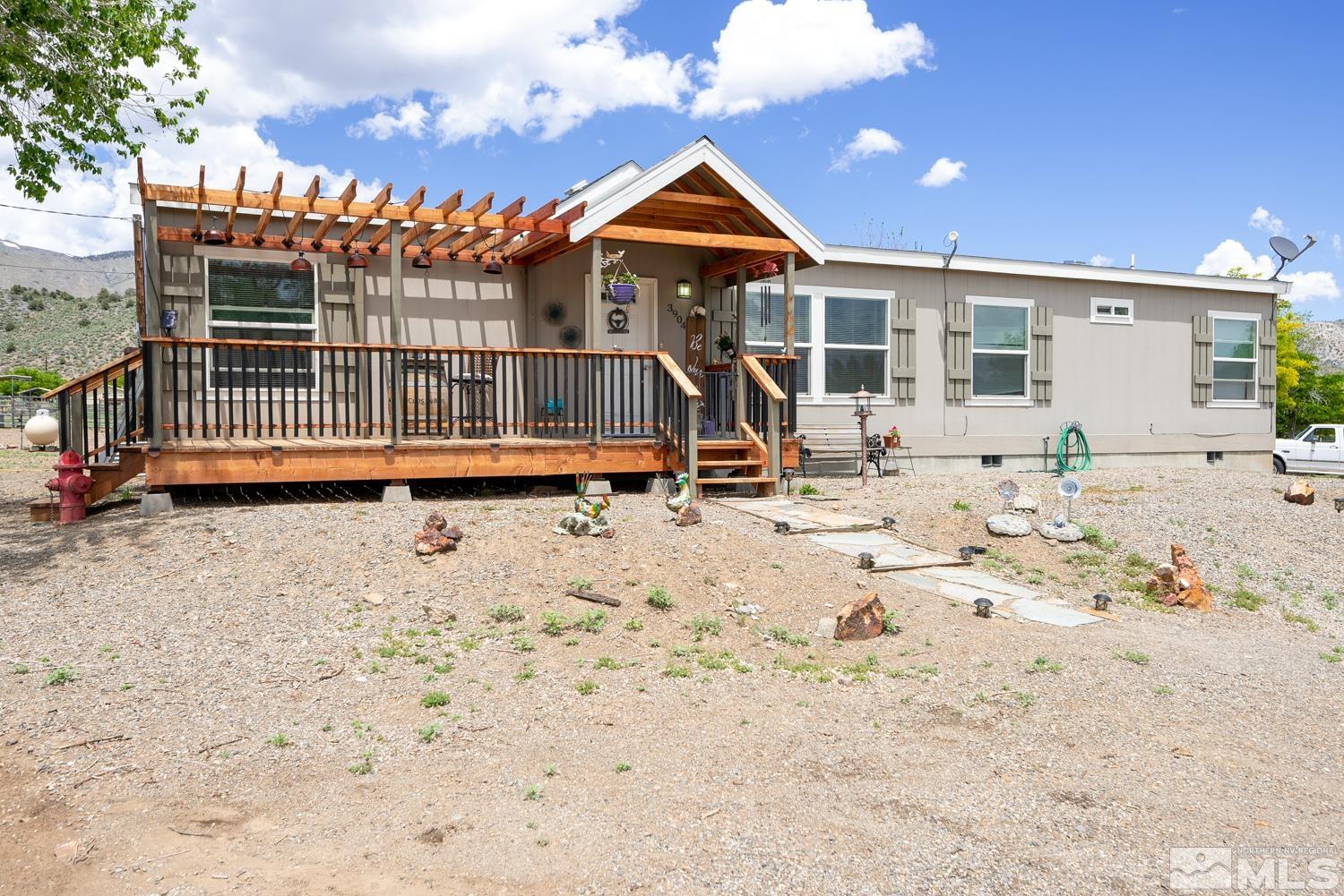 3904 Walker View Road Wellington, NV 89444 - Photo 36 of 37 a view of a house with a yard