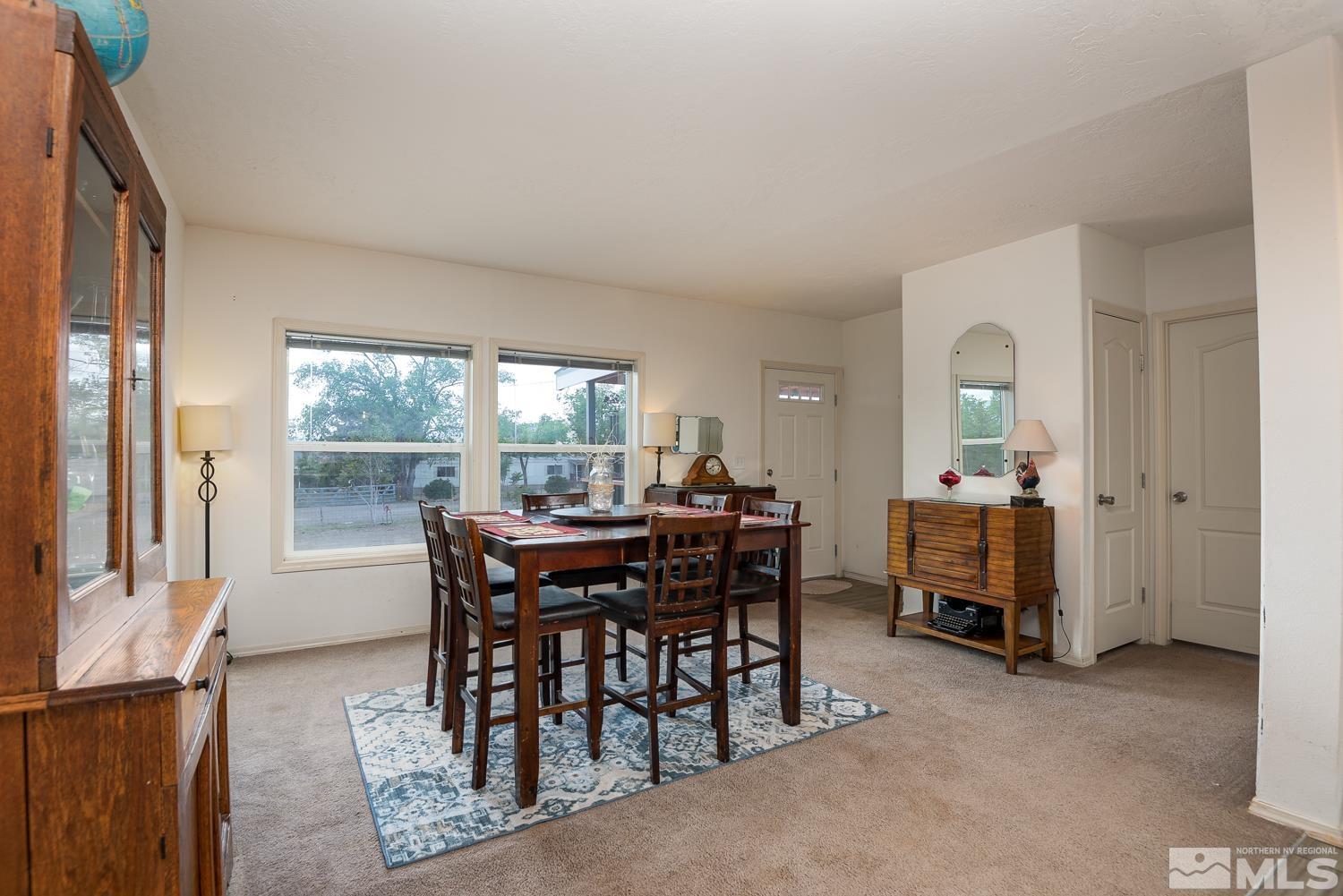 3904 Walker View Road Wellington, NV 89444 - Photo 4 of 37 a view of a dining room with furniture and a window