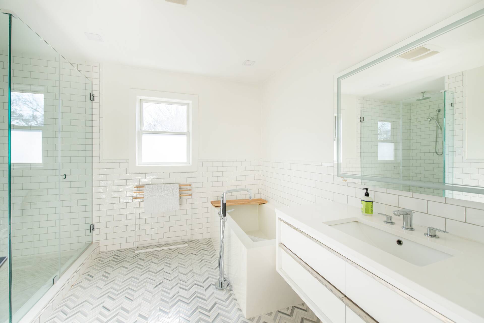 42 Knoll Road Southampton, NY 11968 - Photo 12 of 18 a bathroom with a sink a toilet and shower