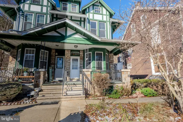 a view of a cafe with sitting area