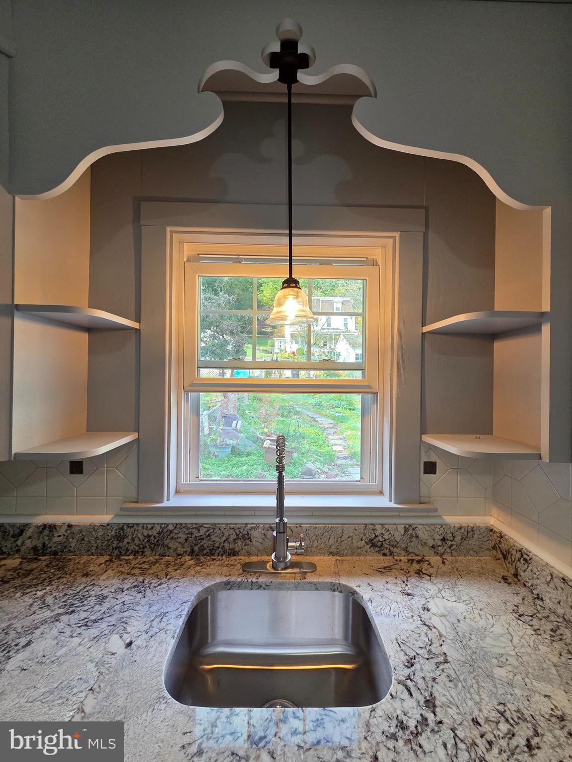 1440 Friedensburg Road Reading, PA 19606 - Photo 15 of 41 a view of a kitchen with a sink and wooden floor