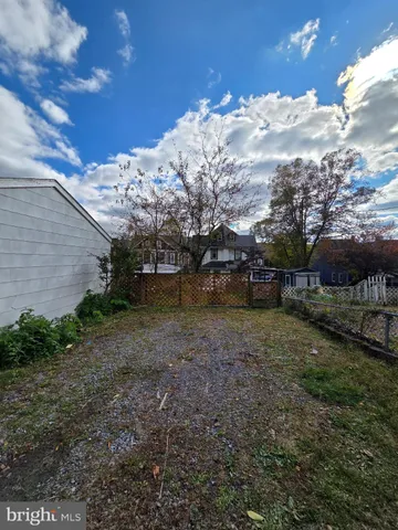 a view of outdoor space yard and mountain view in back