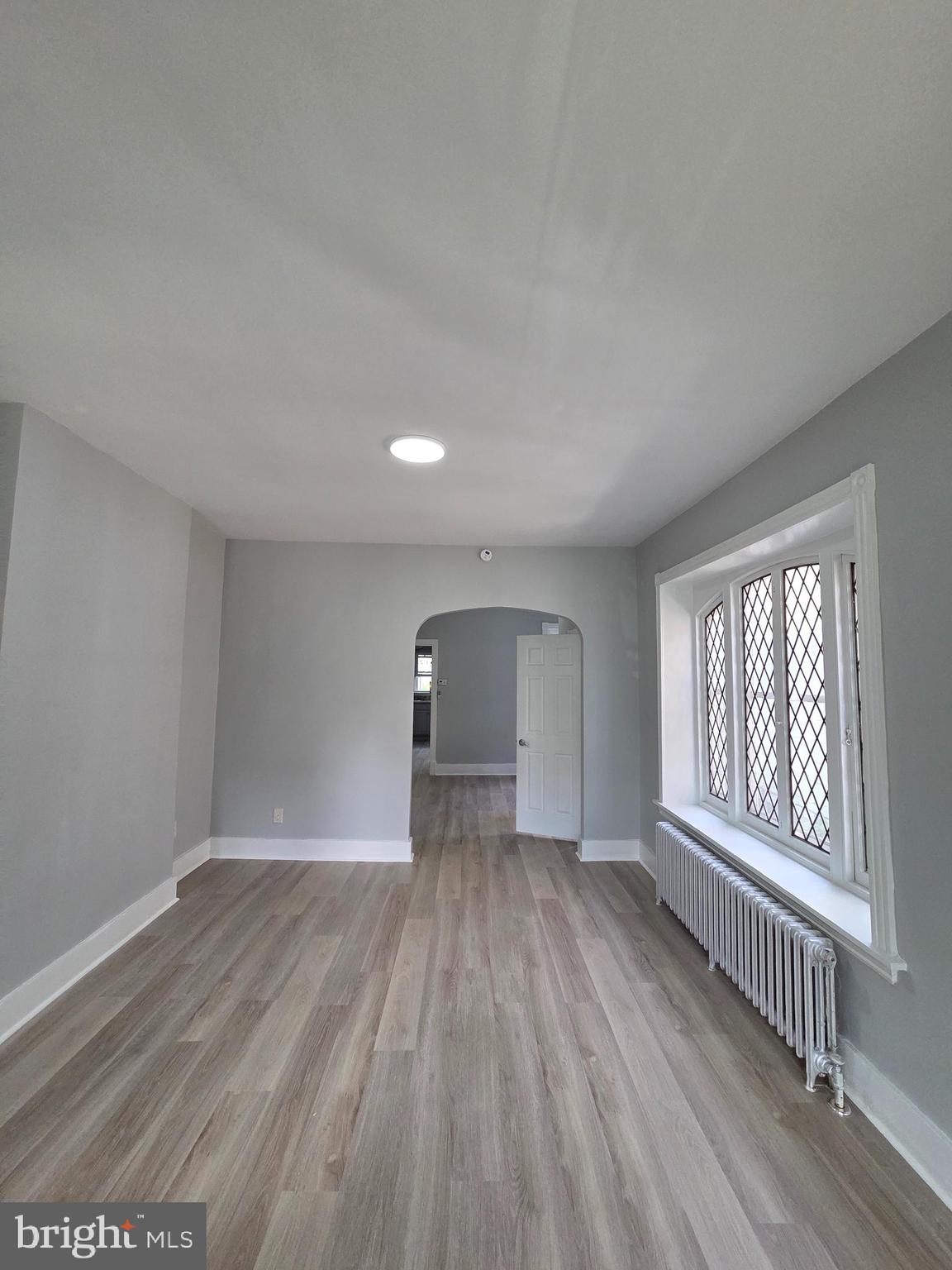 1440 Friedensburg Road Reading, PA 19606 - Photo 5 of 41 wooden floor in an empty room with a window