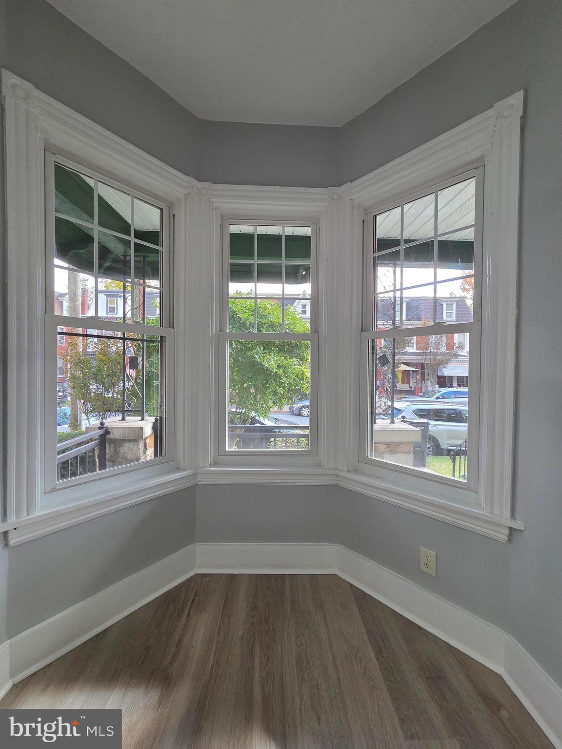 1440 Friedensburg Road Reading, PA 19606 - Photo 7 of 41 a view of an empty room with wooden floor and a window