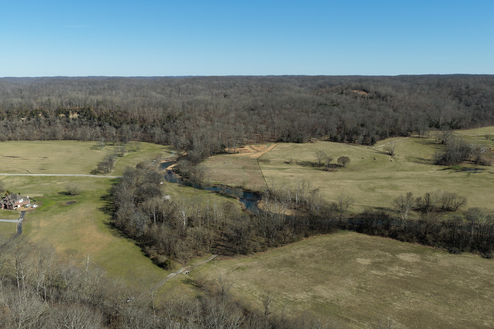 0 Old Harding Road Franklin, TN 37064 - Photo 23 of 28 a view of a dry yard with wooden fence