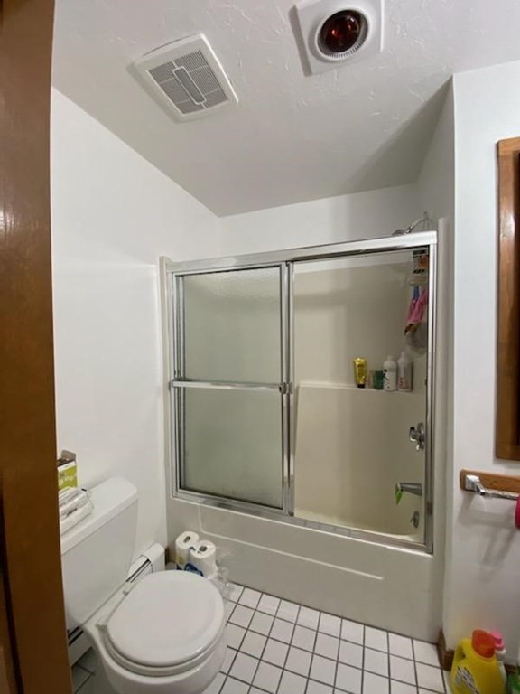 548 Pleasant Street, Unit 2R Worcester, MA 01602 - Photo 5 of 5 a bathroom with a granite countertop sink mirror vanity and toilet