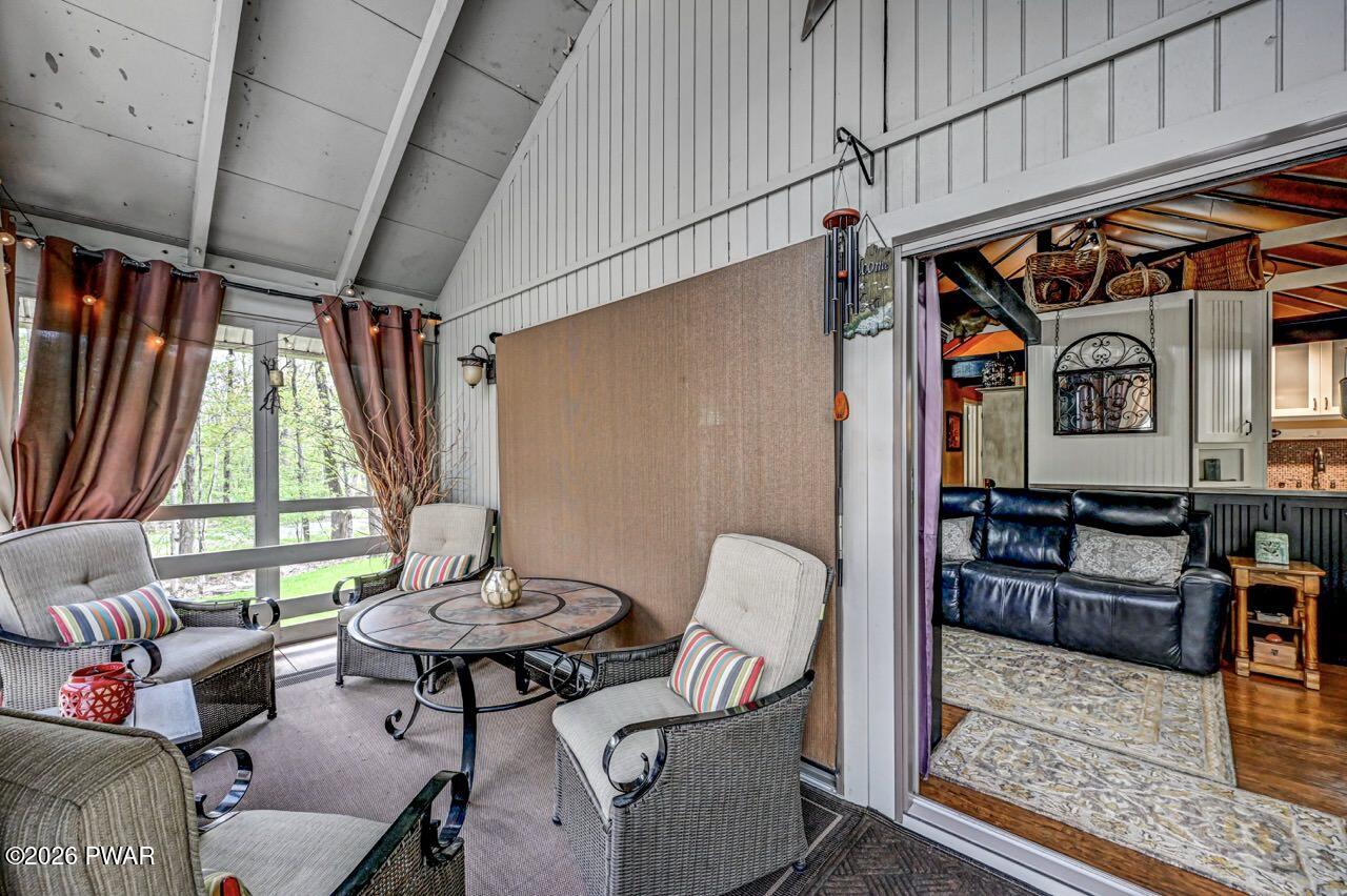 103 Forest Drive Hawley, PA 18428 - Photo 34 of 85 a outdoor living space with furniture and a fireplace