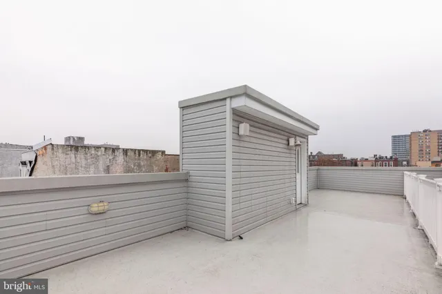 a view of city and a tall buildings