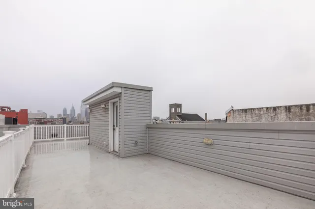 a view of a city with tall buildings