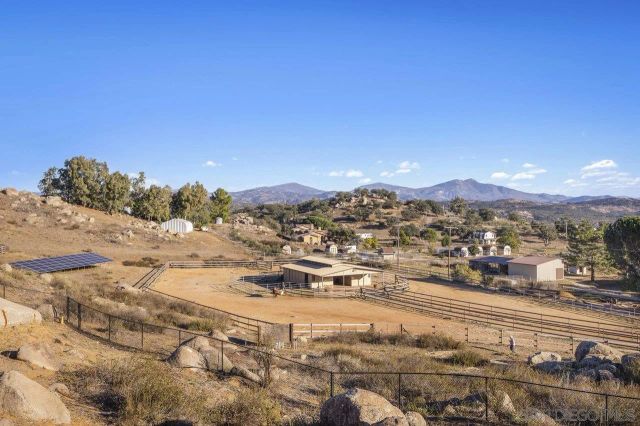 a view of a city with mountains in the background