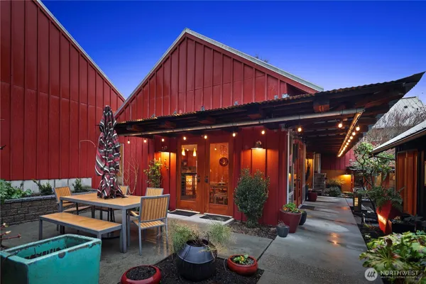 a view of a chairs and tables in patio
