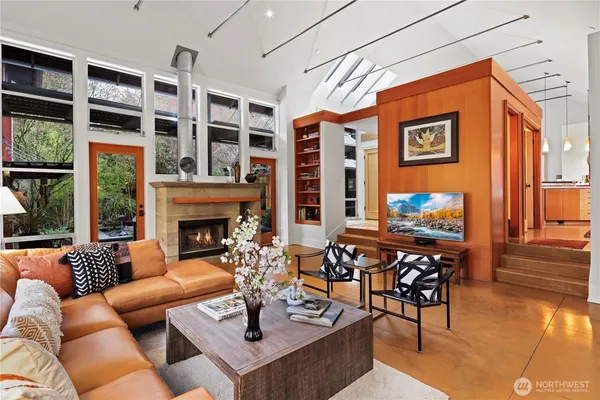 a view of a livingroom with furniture window and outside view