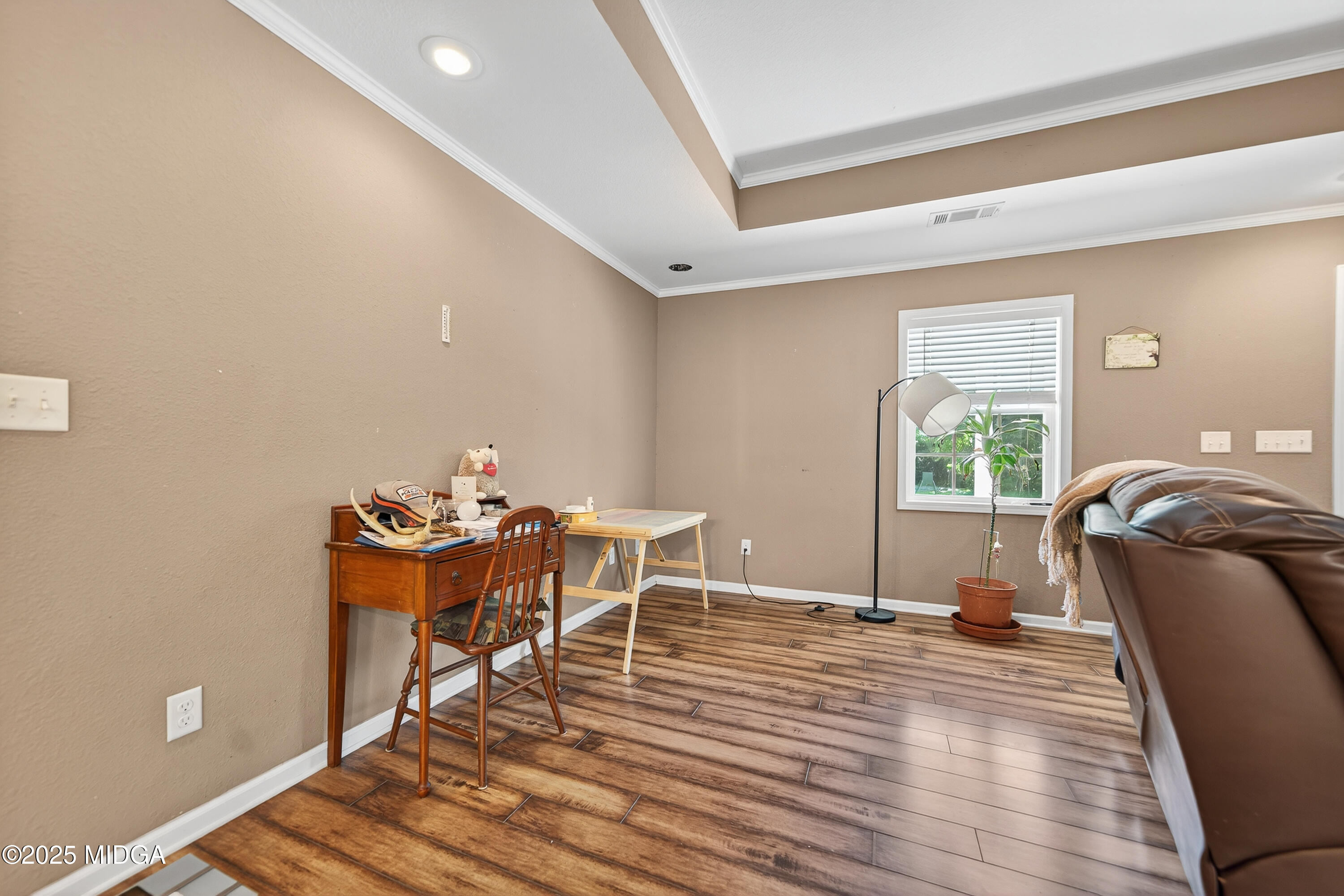 1866 McLendon Road Dublin, GA 31021 - Photo 11 of 48 a workspace with furniture and window