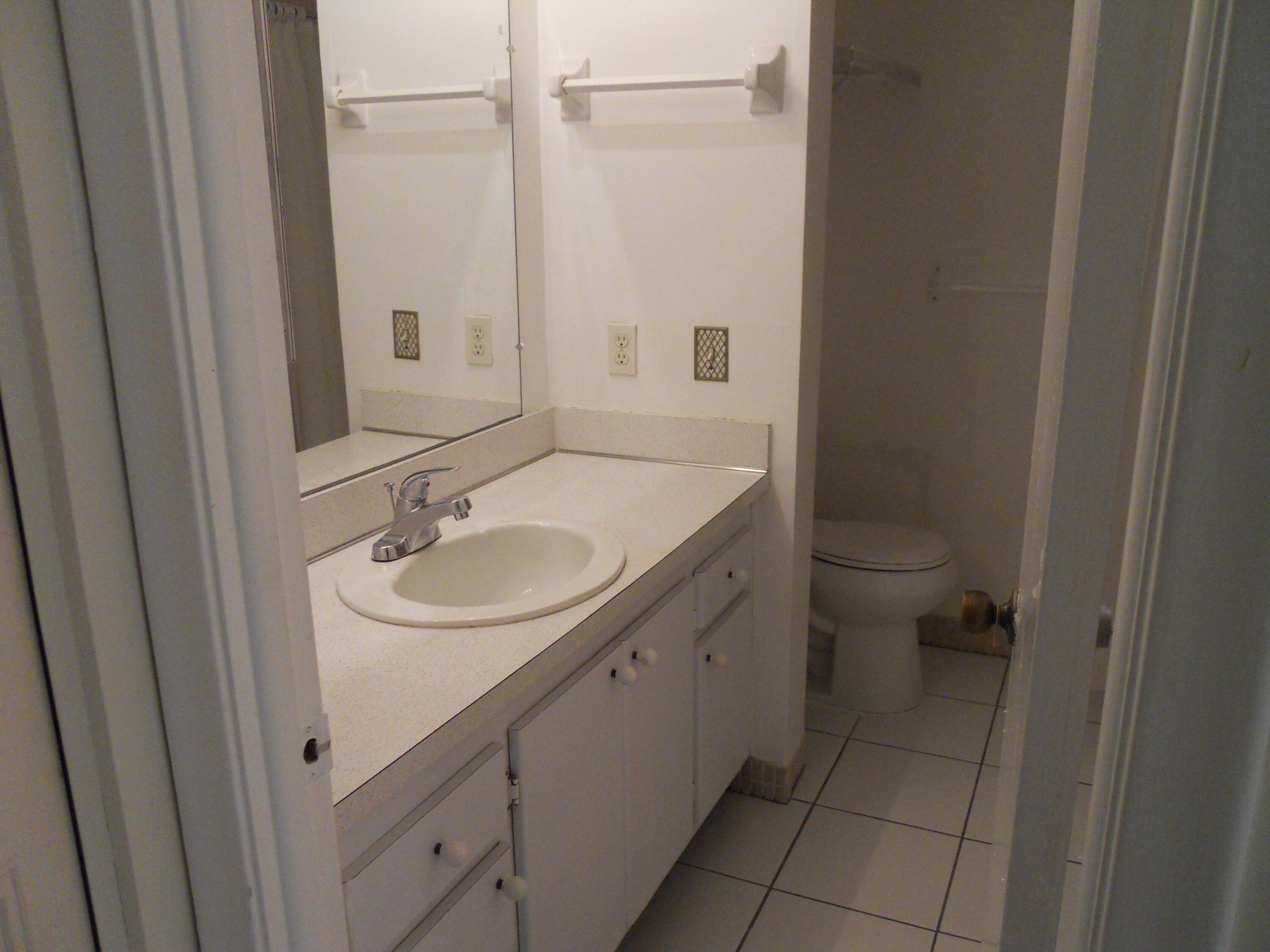 250 Northeast 20th Street, Unit 123S Boca Raton, FL 33431 - Photo 18 of 34 Guest Bath