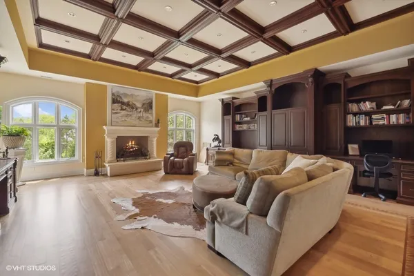 a bed room with bed and a large window