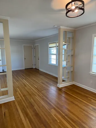 a kitchen with a sink stove and refrigerator
