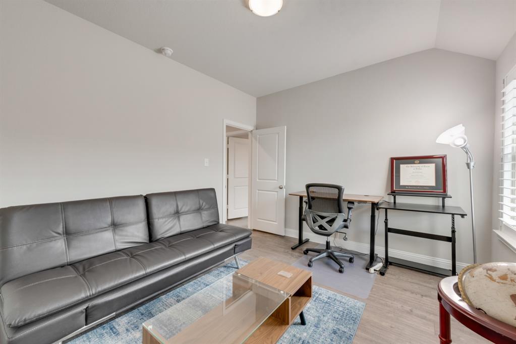 2301 Mount Olive Lane Forney, TX 75126 - Photo 26 of 36 a living room with furniture