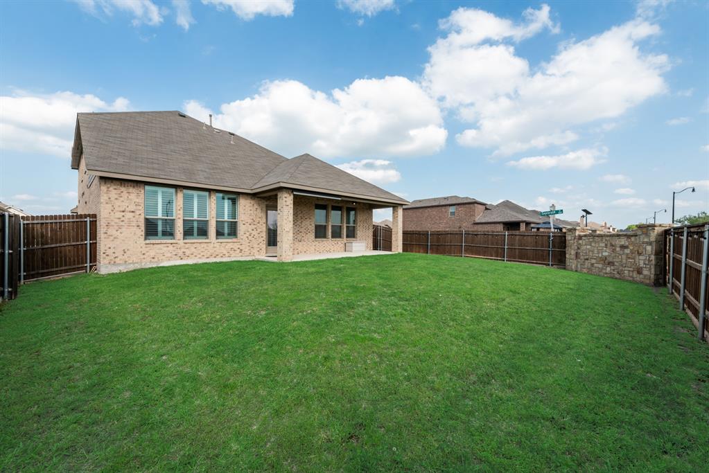2301 Mount Olive Lane Forney, TX 75126 - Photo 28 of 36 a view of a house with a yard and sitting area