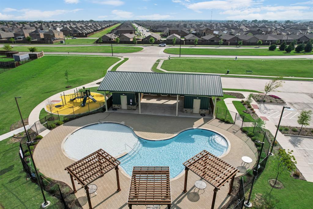 2301 Mount Olive Lane Forney, TX 75126 - Photo 30 of 36 an aerial view of a sitting space with garden view and mountains