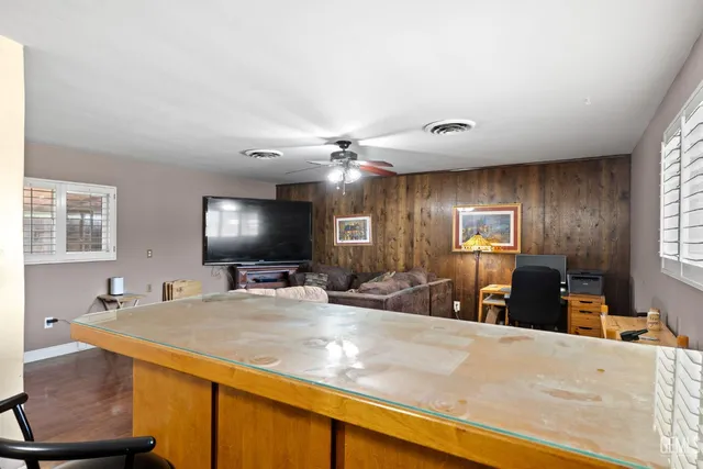 a view of a living room and dining room