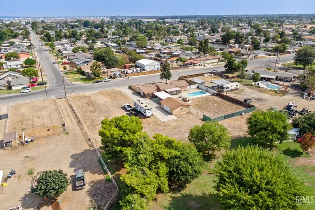an aerial view of a house with a garden