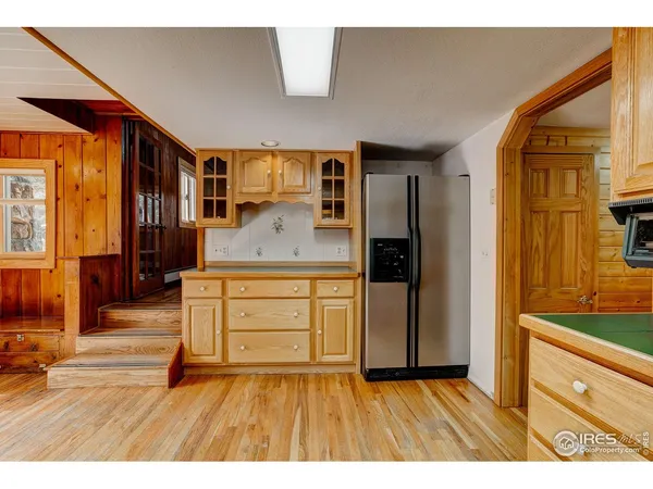 a bathroom with a sink a mirror and a shower