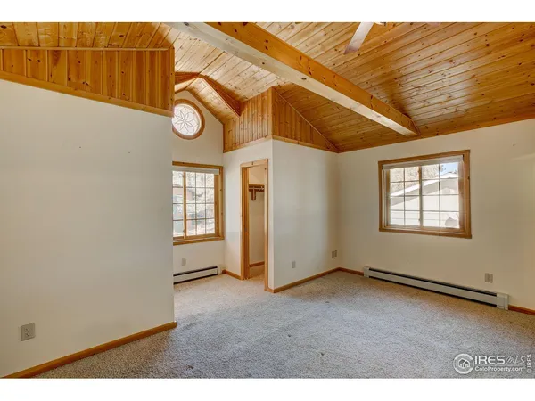 a view of empty room with windows