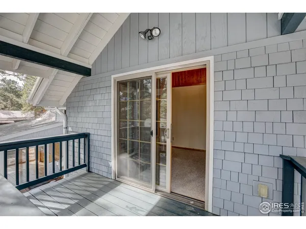 a view of wooden floor in a hall