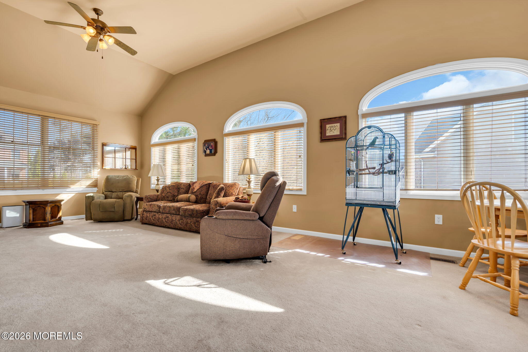 197 Benjamin Street Toms River, NJ 08755 - Photo 11 of 49 a living room with furniture a fireplace and a large window