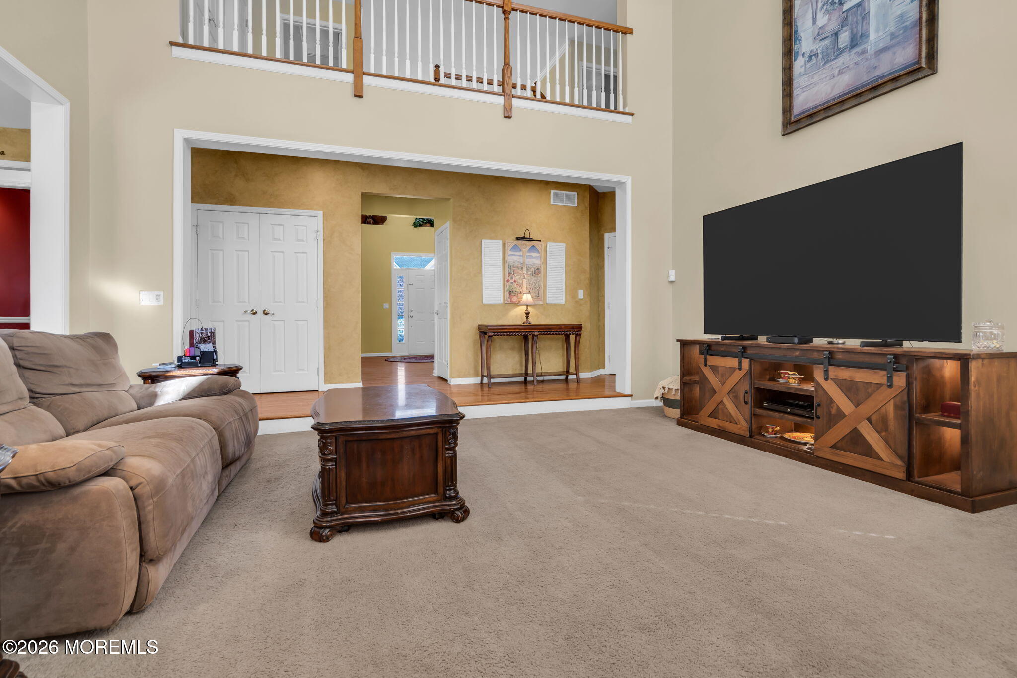 197 Benjamin Street Toms River, NJ 08755 - Photo 19 of 49 a living room with furniture and a flat screen tv
