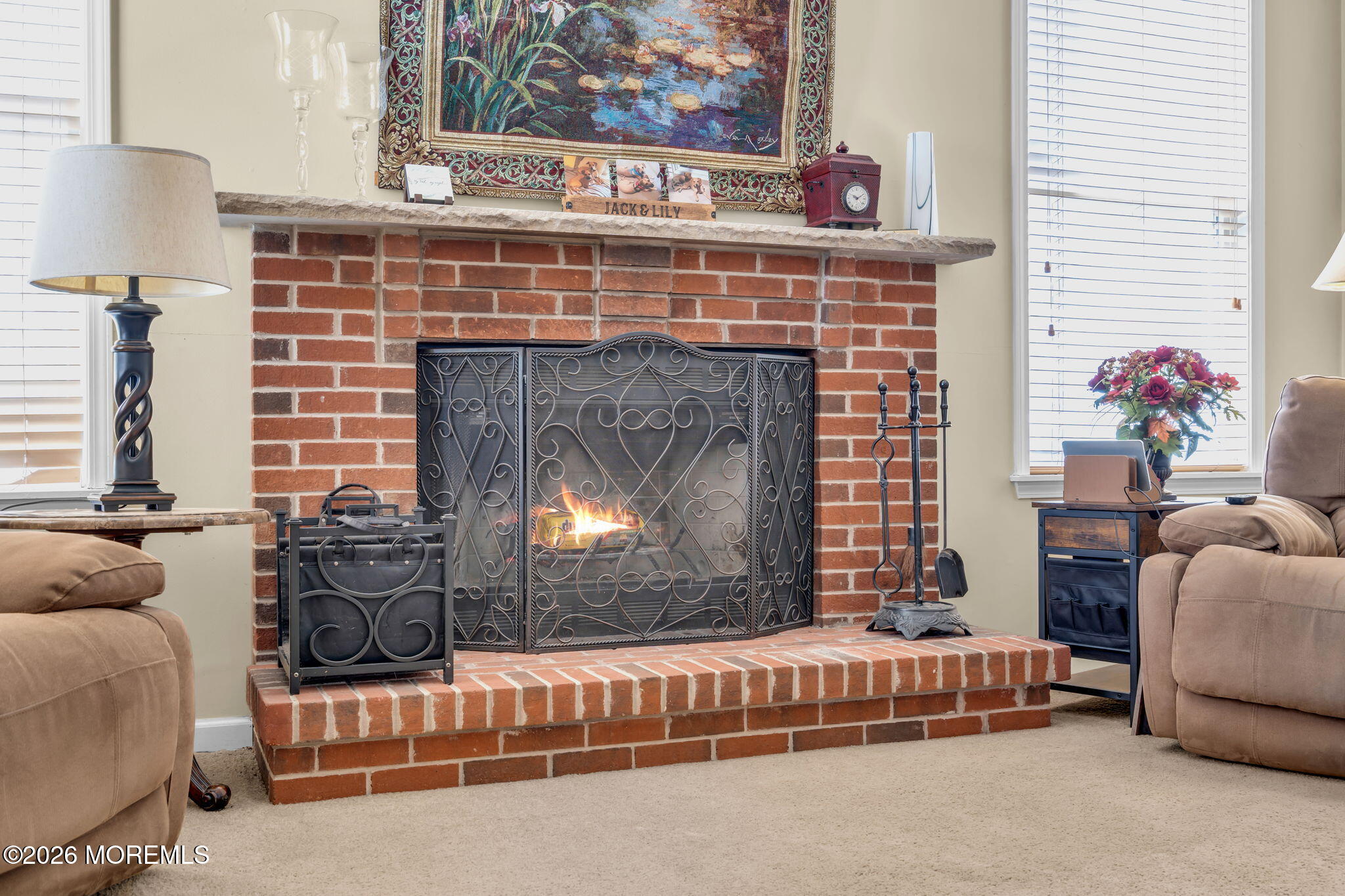 197 Benjamin Street Toms River, NJ 08755 - Photo 20 of 49 a living room with a couch and a fireplace
