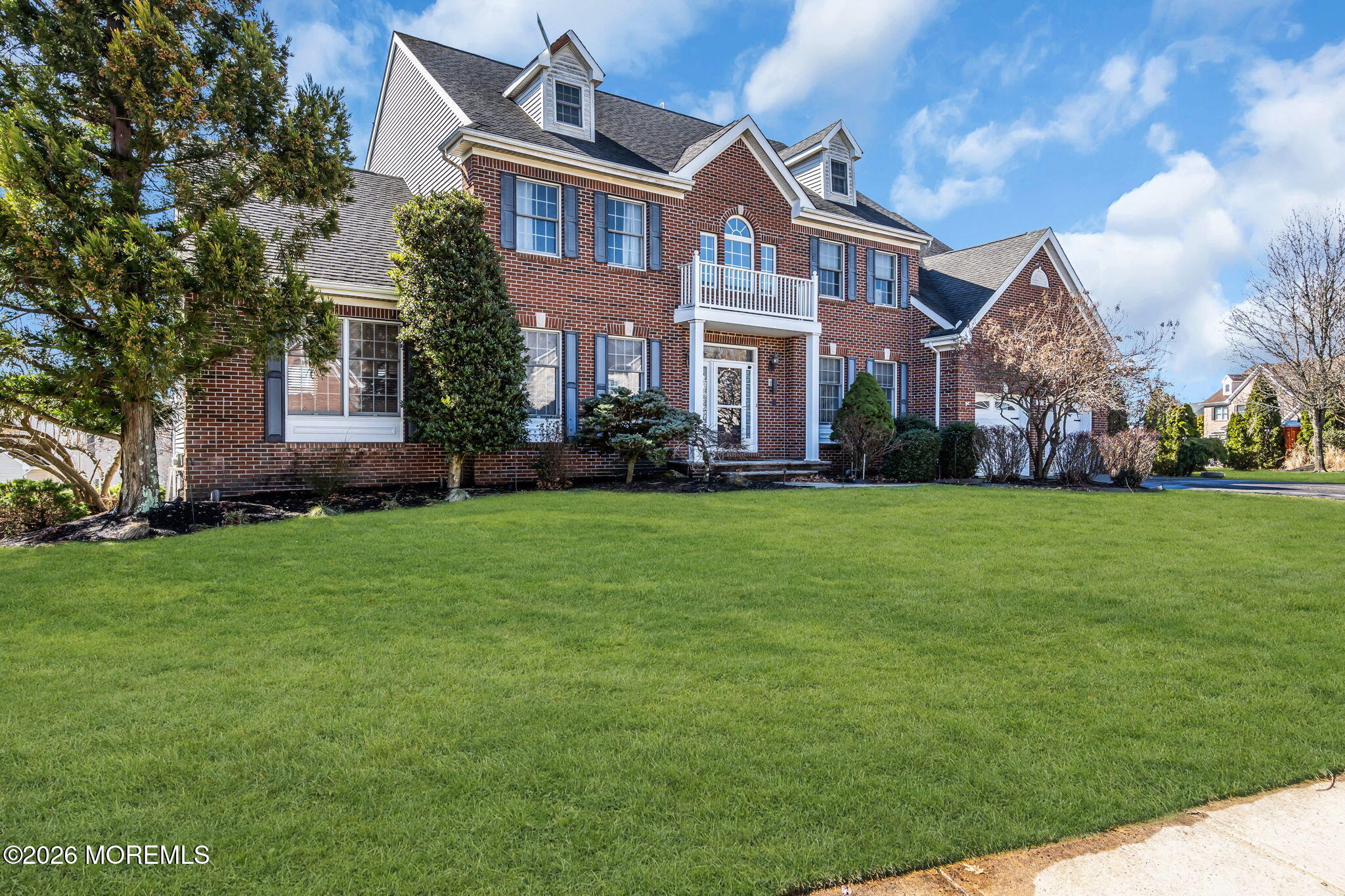 197 Benjamin Street Toms River, NJ 08755 - Photo 2 of 49 a front view of a house with a garden