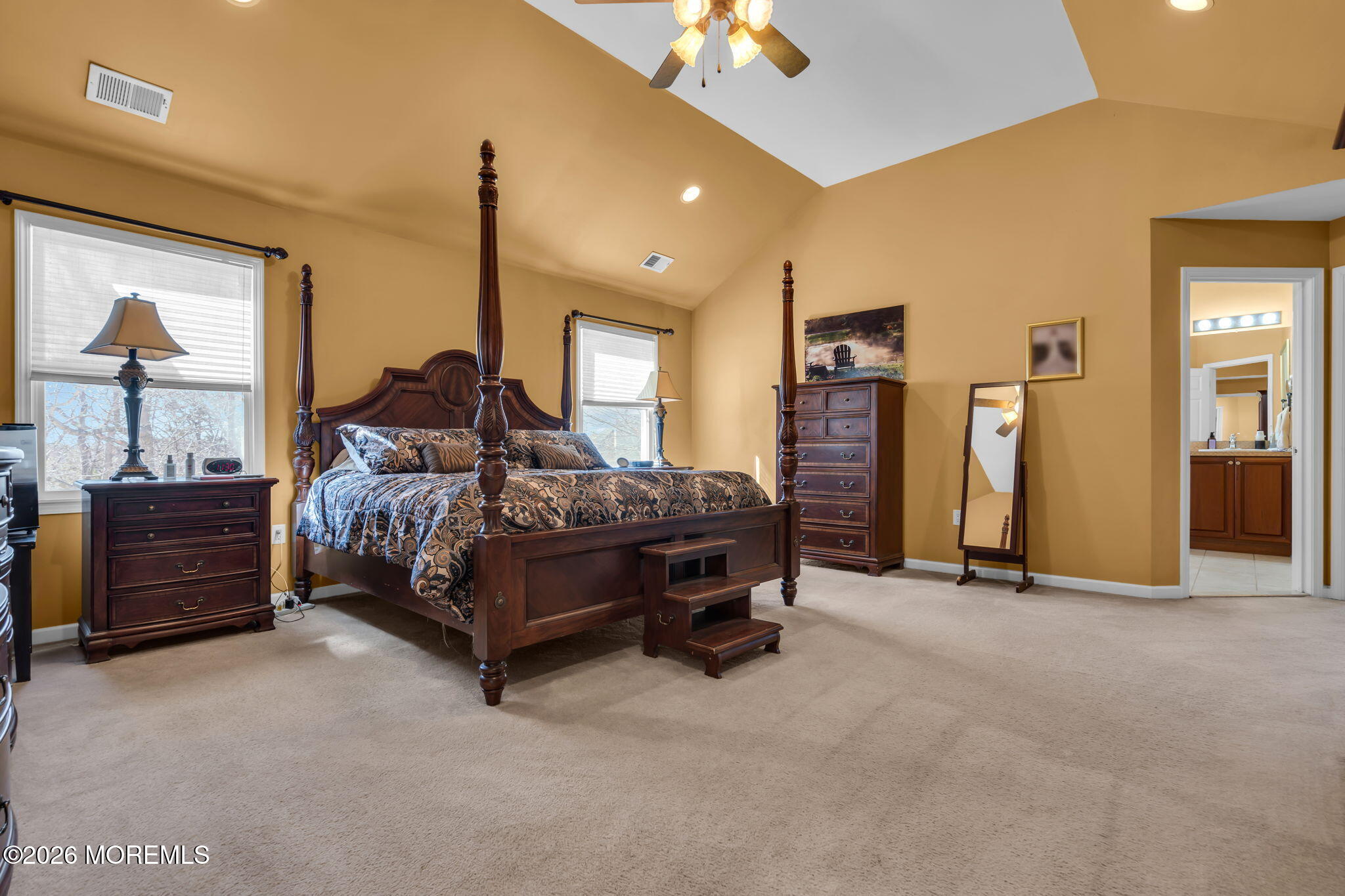 197 Benjamin Street Toms River, NJ 08755 - Photo 28 of 49 a bedroom with a bed and a chandelier
