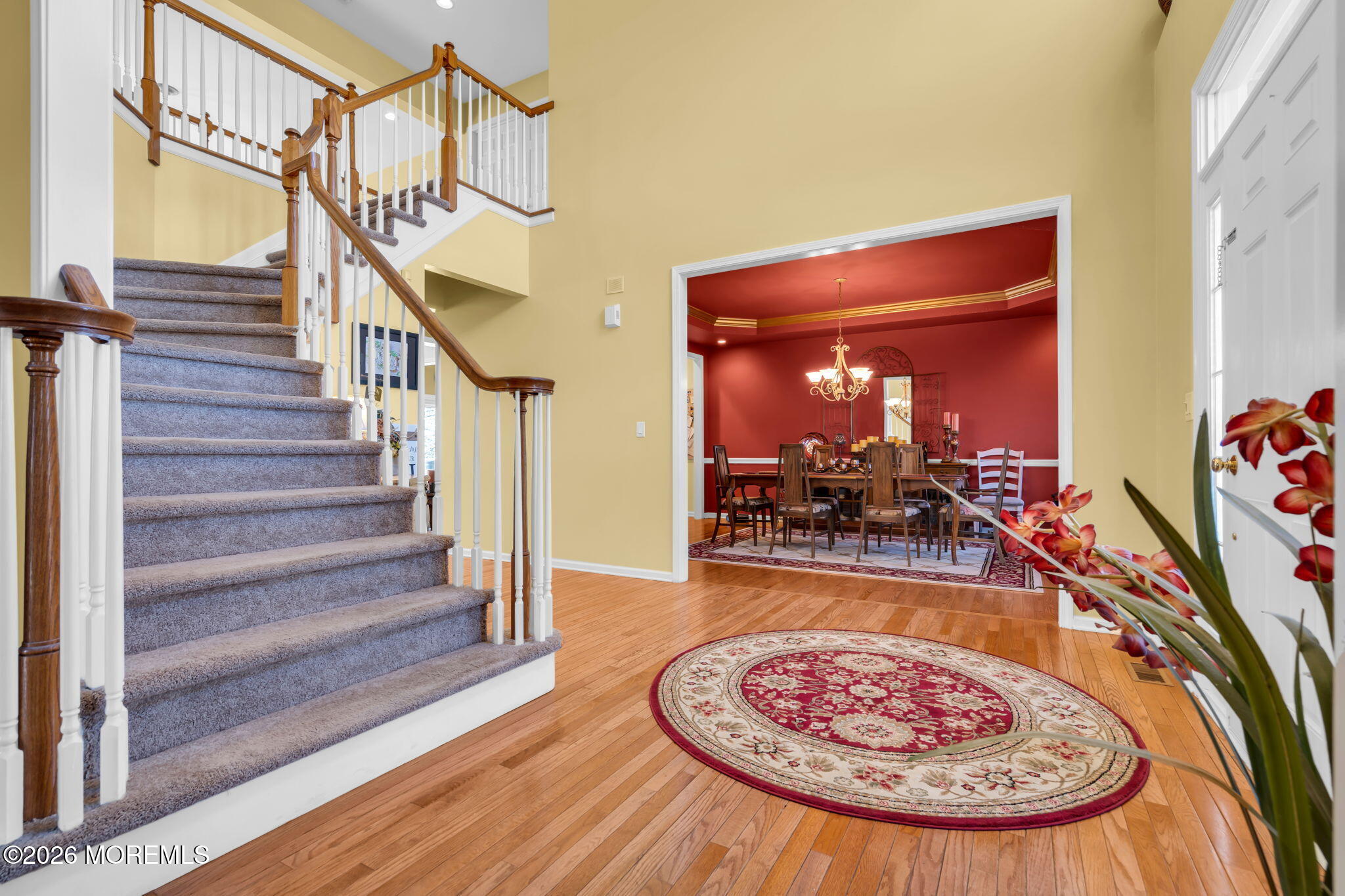 197 Benjamin Street Toms River, NJ 08755 - Photo 3 of 49 a view of a hallway with wooden floor and front door