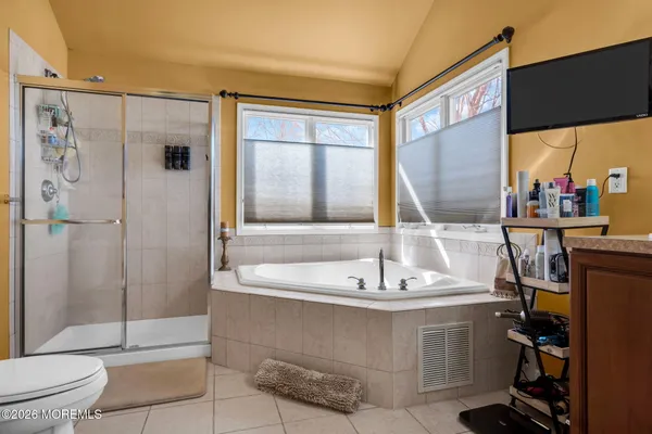 a bathroom with a sink and a large mirror
