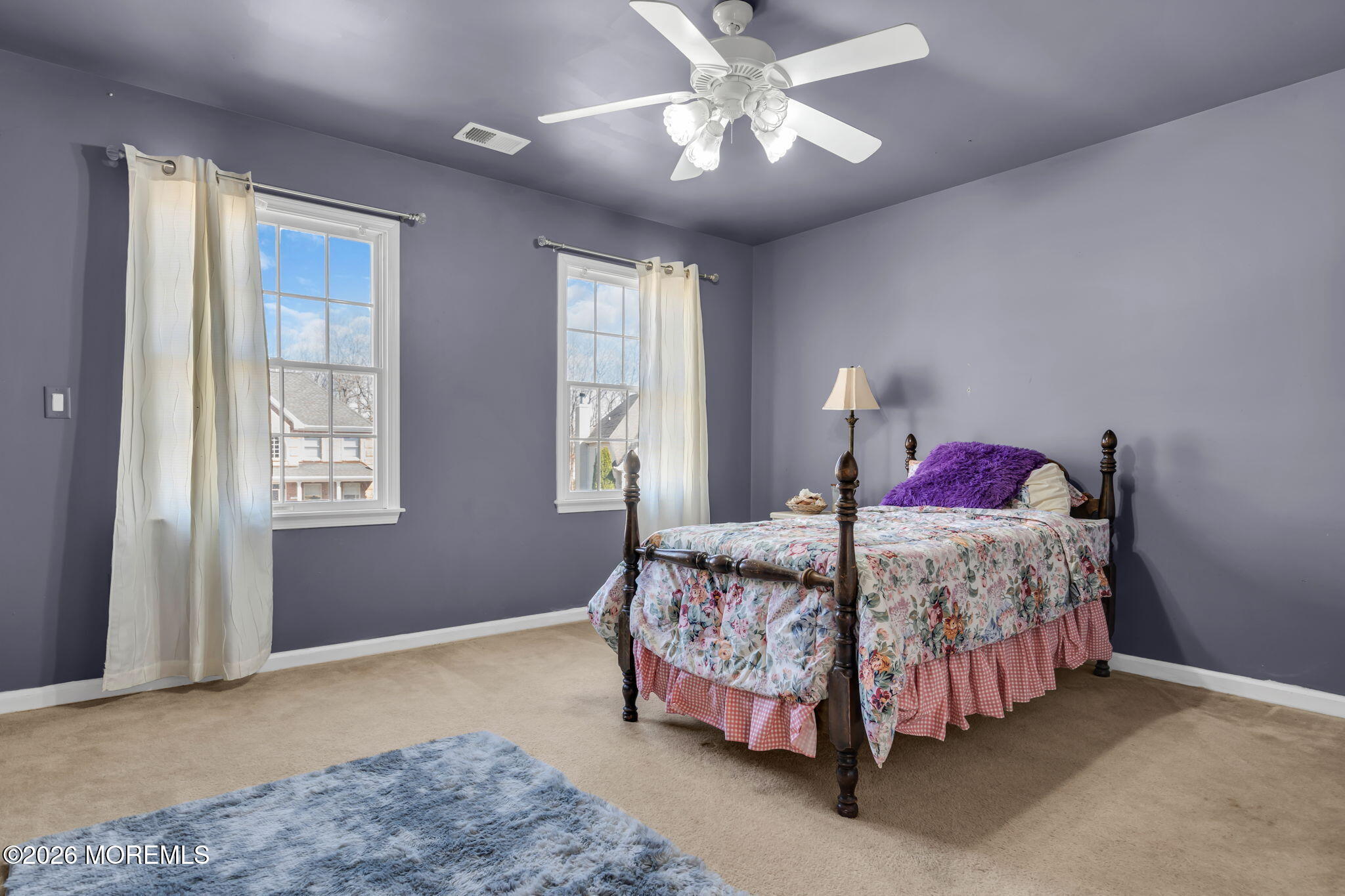 197 Benjamin Street Toms River, NJ 08755 - Photo 33 of 49 a bedroom with a bed and a chandelier
