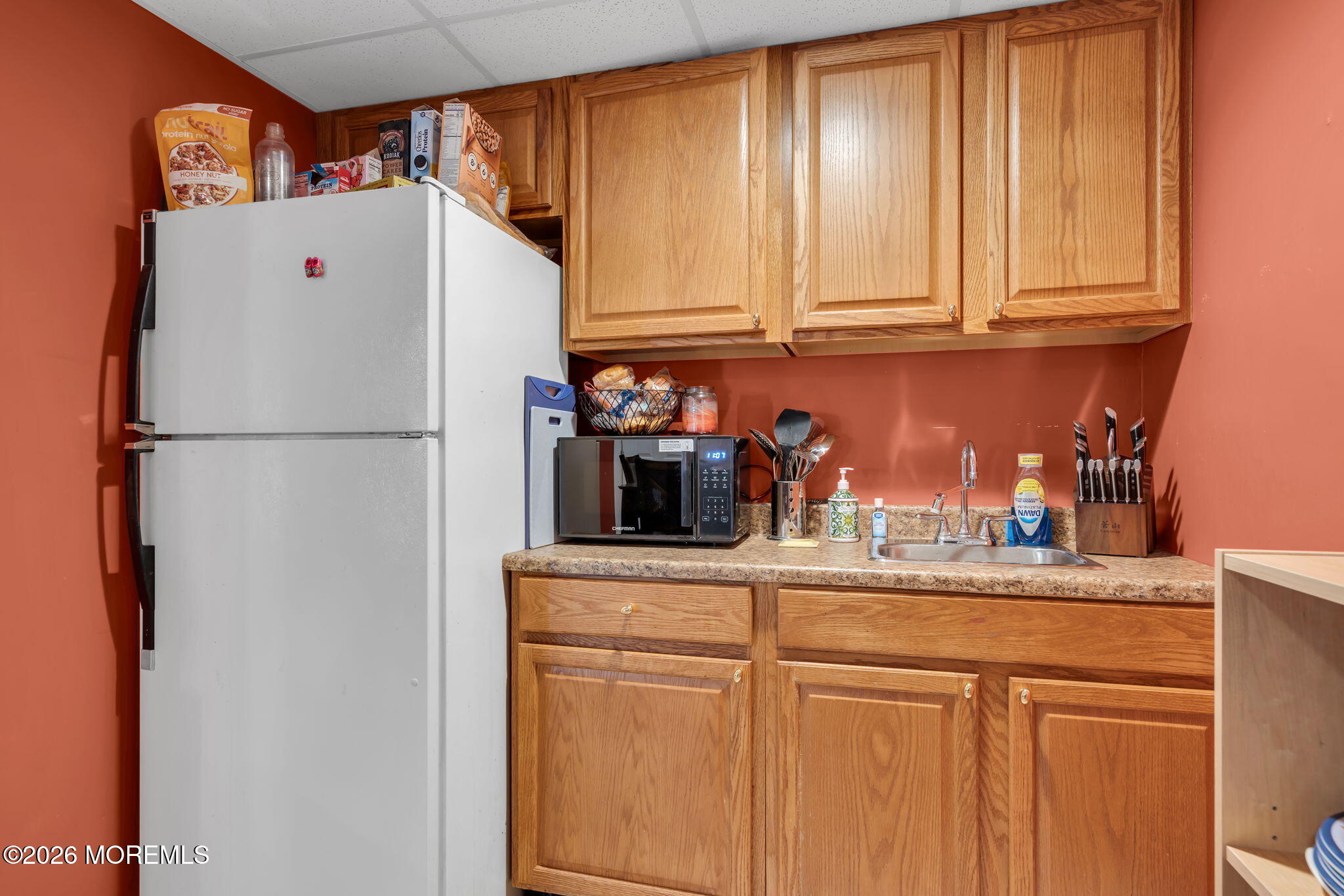 197 Benjamin Street Toms River, NJ 08755 - Photo 39 of 49 a white refrigerator freezer sitting in a kitchen
