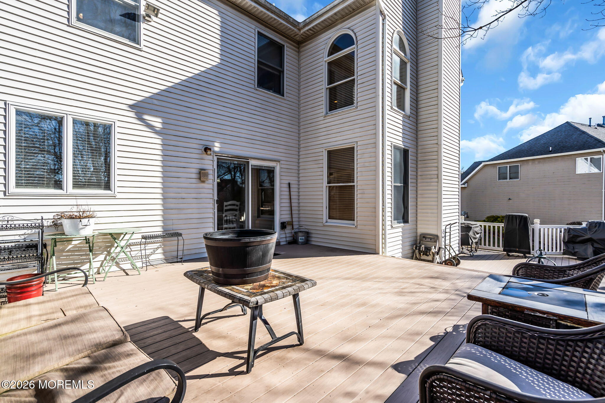 197 Benjamin Street Toms River, NJ 08755 - Photo 48 of 49 a view of a patio with table and chairs and barbeque